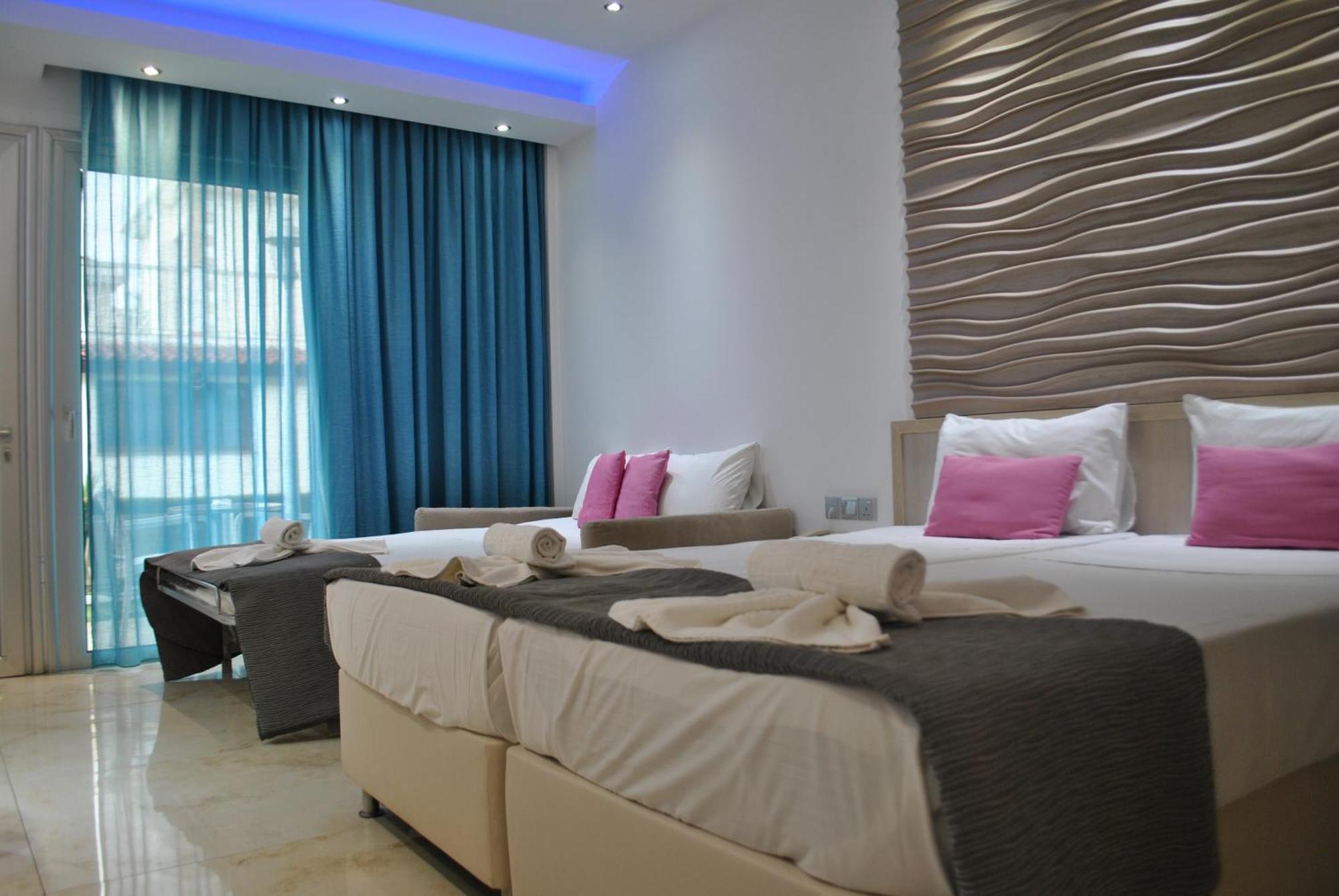 Loutsiana Deluxe Apts Ajía Nápa Szoba fotó